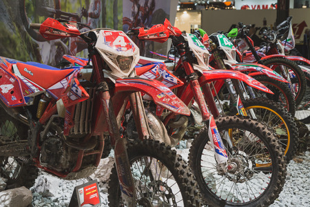 MILAN, ITALY - NOVEMBER 5: Motocross bikes on display at EICMA, international motorcycle exhibition on NOVEMBER 5, 2014 in Milan.のeditorial素材