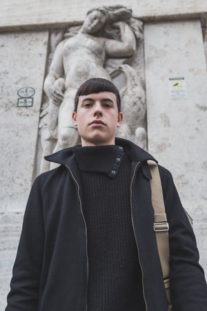 MILAN, ITALY - JANUARY 18: People gather outside Ferragamo fashion show building for Milan Men's Fashion Week on JANUARY 18, 2015 in Milan.のeditorial素材