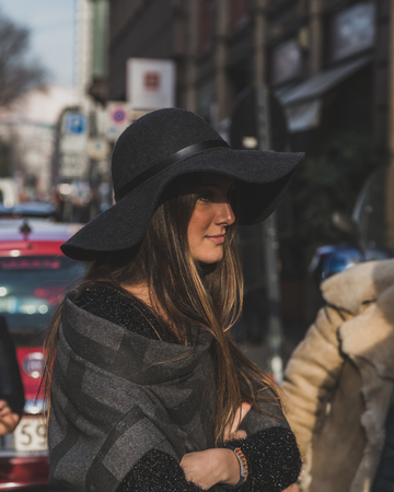 MILAN, ITALY - JANUARY 18: People gather outside Vivienne Westwood fashion show building for Milan Men's Fashion Week on JANUARY 18, 2015 in Milan.のeditorial素材