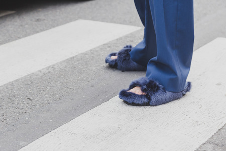MILAN, ITALY - JANUARY 19: Detail of male shoes outside Armani fashion show building for Milan Men's Fashion Week on JANUARY 19, 2015 in Milan.のeditorial素材