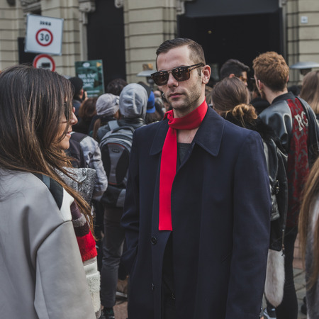 MILAN, ITALY - JANUARY 19: People gather outside Gucci fashion show building for Milan Men's Fashion Week on JANUARY 19, 2015 in Milan.のeditorial素材