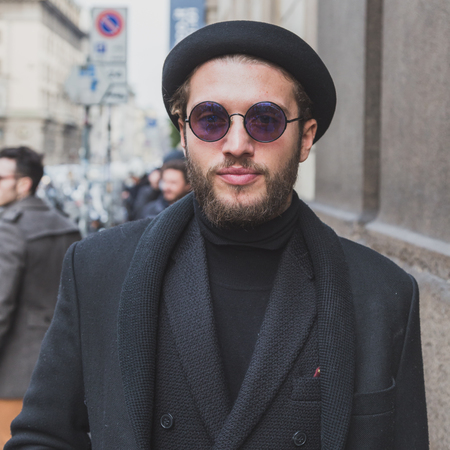 MILAN, ITALY - JANUARY 20: People gather outside Cavalli fashion show building for Milan Men's Fashion Week on JANUARY 20, 2015 in Milan.のeditorial素材