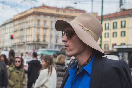 MILAN, ITALY - FEBRUARY 25: People gather outside Gucci fashion show building for Milan Women's Fashion Week on FEBRUARY 25, 2015  in Milan.のeditorial素材