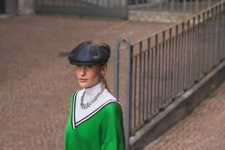 MILAN, ITALY - FEBRUARY 25: Beautiful girl poses outside Alberta Ferretti fashion show building for Milan Women's Fashion Week on FEBRUARY 25, 2015  in Milan.のeditorial素材