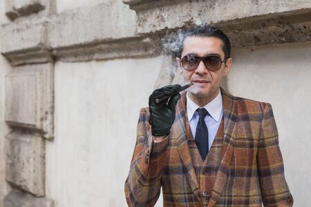 MILAN, ITALY - FEBRUARY 26: People gather outside Anteprima fashion show building for Milan Women's Fashion Week on FEBRUARY 26, 2015  in Milan.のeditorial素材