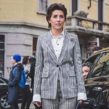 MILAN, ITALY - FEBRUARY 27: People gather outside Armani fashion show building for Milan Women's Fashion Week on FEBRUARY 27, 2015  in Milan.のeditorial素材