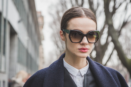 MILAN, ITALY - FEBRUARY 27: Beautiful model poses outside Armani fashion show building for Milan Women's Fashion Week on FEBRUARY 27, 2015  in Milan.のeditorial素材