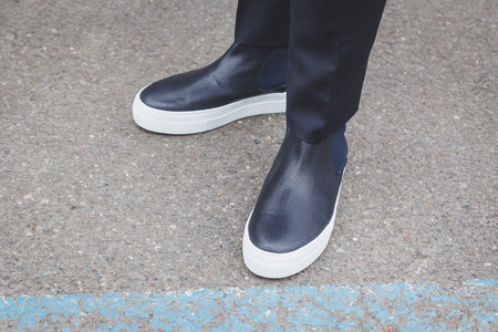 MILAN, ITALY - FEBRUARY 27: Detail of shoes outside Armani fashion show building for Milan Women's Fashion Week on FEBRUARY 27, 2015  in Milan.のeditorial素材