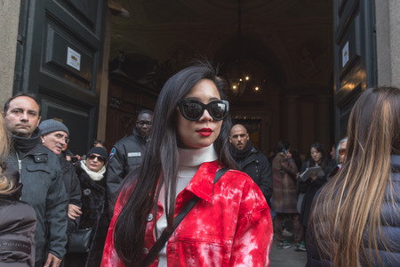 MILAN, ITALY - MARCH 1: People gather outside Trussardi fashion show building for Milan Women's Fashion Week on MARCH 1, 2015  in Milan.のeditorial素材