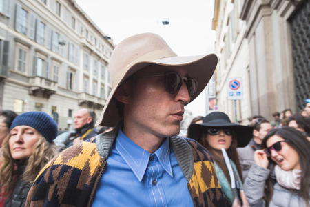 MILAN, ITALY - MARCH 1: People gather outside Trussardi fashion show building for Milan Women's Fashion Week on MARCH 1, 2015  in Milan.のeditorial素材