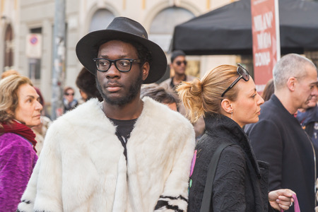 MILAN, ITALY - MARCH 2: People gather outside Alberto Zambelli fashion show building for Milan Women's Fashion Week on MARCH 2, 2015  in Milan.のeditorial素材