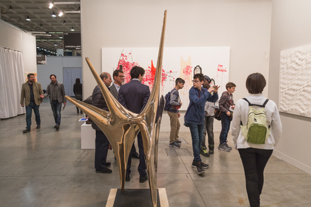 MILAN, ITALY - APRIL 10: People visit Miart, international exhibition of modern and contemporary art on APRIL 10, 2015 in Milan.のeditorial素材