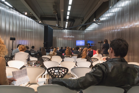 MILAN, ITALY - APRIL 10: People follow a conference at Miart, international exhibition of modern and contemporary art on APRIL 10, 2015 in Milan.のeditorial素材