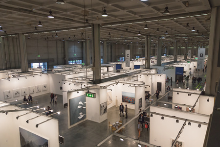 MILAN, ITALY - APRIL 10: Top view of people and booths at Miart, international exhibition of modern and contemporary art on APRIL 10, 2015 in Milan.のeditorial素材