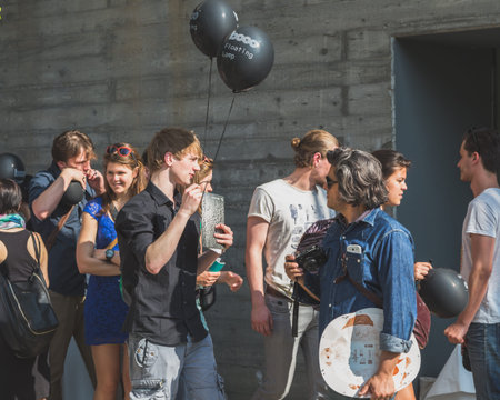 MILAN, ITALY - APRIL 15: People visit Fuorisalone at Ventura Lambrate space, location of important events during Milan Design Week on APRIL 15, 2015 in Milan.のeditorial素材