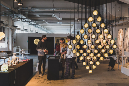 MILAN, ITALY - APRIL 18: People visit Fuorisalone, series of important and interesting events all around the town during Milan Design Week on APRIL 18, 2015 in Milan.のeditorial素材