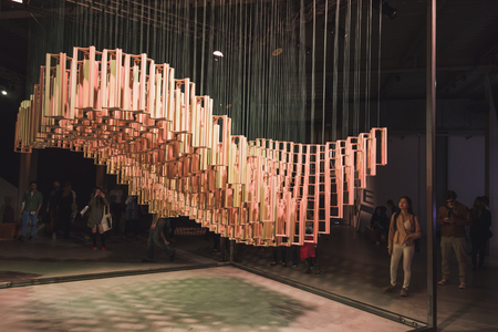 MILAN, ITALY - APRIL 18: People visit Fuorisalone, series of important and interesting events all around the town during Milan Design Week on APRIL 18, 2015 in Milan.のeditorial素材