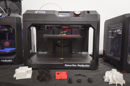 MILAN, ITALY - APRIL 18: 3D printer on display at Fuorisalone, series of important and interesting events all around the town during Milan Design Week on APRIL 18, 2015 in Milan.のeditorial素材