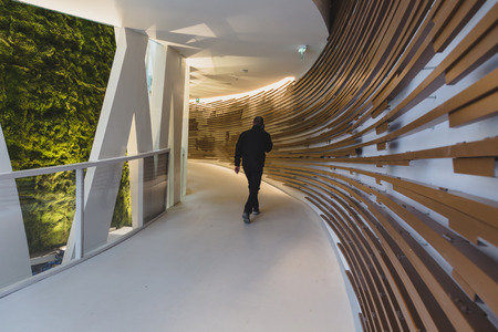 MILAN, ITALY - MAY 1: Man walks inside China pavilion at Expo, universal exposition on the theme of food on MAY 1, 2015 in Milan.のeditorial素材