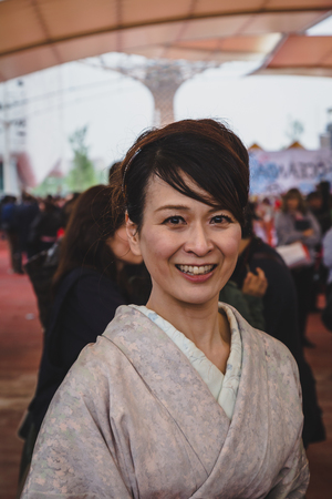MILAN, ITALY - MAY 1: Woman visits Expo, universal exposition on the theme of food on MAY 1, 2015 in Milan.のeditorial素材