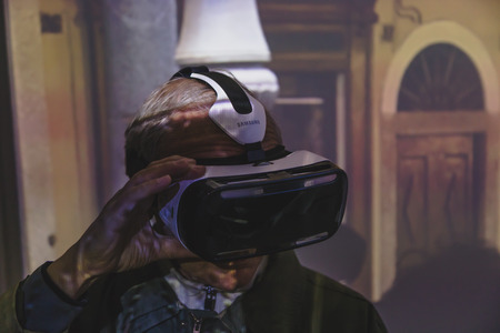 MILAN, ITALY - MAY 1: Man tries virtual reality headset at Expo, universal exposition on the theme of food on MAY 1, 2015 in Milan.のeditorial素材
