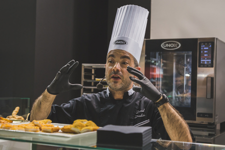 MILAN, ITALY - MAY 4:  Cook working at Tuttofood, world food exhibition on MAY 4, 2015 in Milan.のeditorial素材