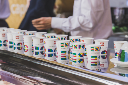 MILAN, ITALY - MAY 4: Paper cups with Expo logo at Tuttofood, world food exhibition on MAY 4, 2015 in Milan.のeditorial素材