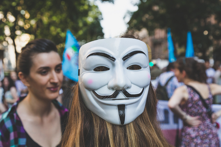 MILAN, ITALY - JUNE 27: People at gay pride parade in Milan JUNE 27, 2015. Thousands of people march in the city streets for the annual gay pride parade, claiming equality and legal rights.のeditorial素材
