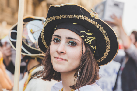 MILAN, ITALY - JUNE 27: People at gay pride parade in Milan JUNE 27, 2015. Thousands of people march in the city streets for the annual gay pride parade, claiming equality and legal rights.のeditorial素材