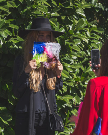 MILAN, ITALY - SEPTEMBER 24: People gather outside Pucci fashion show building for Milan Women's Fashion Week on SEPTEMBER 24, 2015  in Milan.のeditorial素材