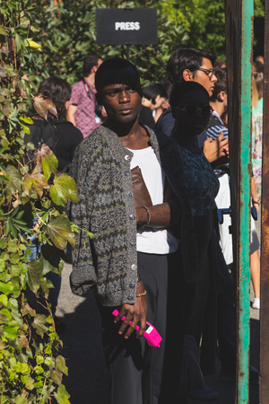 MILAN, ITALY - SEPTEMBER 24: People gather outside Pucci fashion show building for Milan Women's Fashion Week on SEPTEMBER 24, 2015  in Milan.のeditorial素材