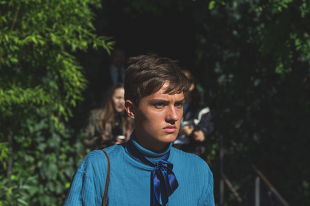 MILAN, ITALY - SEPTEMBER 24: People gather outside Pucci fashion show building for Milan Women's Fashion Week on SEPTEMBER 24, 2015  in Milan.のeditorial素材
