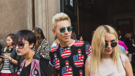 MILAN, ITALY - SEPTEMBER 26: People gather outside Scervino fashion show building for Milan Women's Fashion Week on SEPTEMBER 26, 2015  in Milan.のeditorial素材