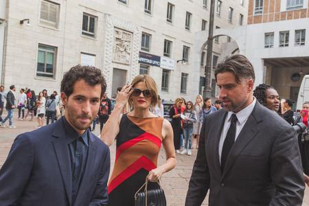 MILAN, ITALY - SEPTEMBER 27: People gather outside Ferragamo fashion show building for Milan Women's Fashion Week on SEPTEMBER 27, 2015  in Milan.のeditorial素材