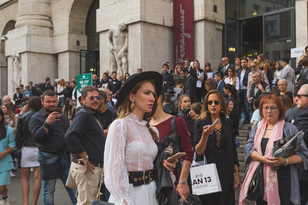 MILAN, ITALY - SEPTEMBER 27: People gather outside Ferragamo fashion show building for Milan Women's Fashion Week on SEPTEMBER 27, 2015  in Milan.のeditorial素材
