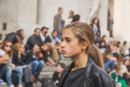 MILAN, ITALY - SEPTEMBER 27: People gather outside Ferragamo fashion show building for Milan Women's Fashion Week on SEPTEMBER 27, 2015  in Milan.のeditorial素材