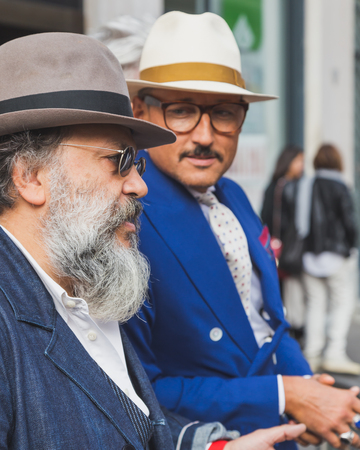 MILAN, ITALY - SEPTEMBER 27: People gather outside Ferragamo fashion show building for Milan Women's Fashion Week on SEPTEMBER 27, 2015  in Milan.のeditorial素材