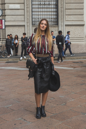 MILAN, ITALY - SEPTEMBER 27: People gather outside Ferragamo fashion show building for Milan Women's Fashion Week on SEPTEMBER 27, 2015  in Milan.のeditorial素材
