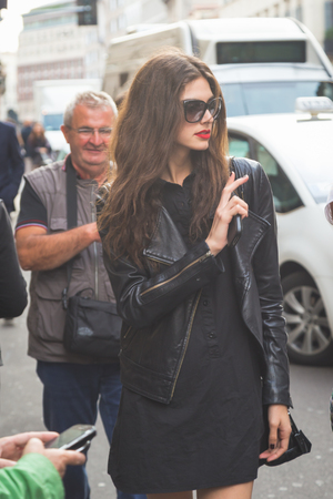 MILAN, ITALY - SEPTEMBER 27: People gather outside Trussardi fashion show building for Milan Women's Fashion Week on SEPTEMBER 27, 2015  in Milan.のeditorial素材