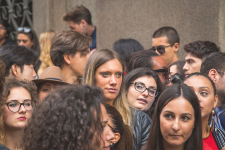 MILAN, ITALY - SEPTEMBER 27: People gather outside Trussardi fashion show building for Milan Women's Fashion Week on SEPTEMBER 27, 2015  in Milan.のeditorial素材