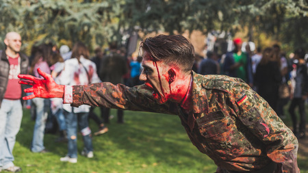 MILAN, ITALY - OCTOBER 10: People take part in the Zombie Walk, social event in the city streets just before Halloween on OCTOBER 10, 2015 in Milan.のeditorial素材