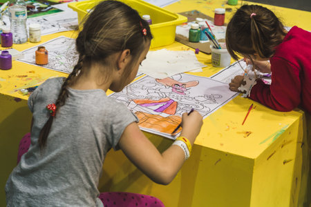 MILAN, ITALY - NOVEMBER 20: Children play at G come giocare, trade fair dedicated to games, toys and children on NOVEMBER 20, 2015 in Milan.のeditorial素材