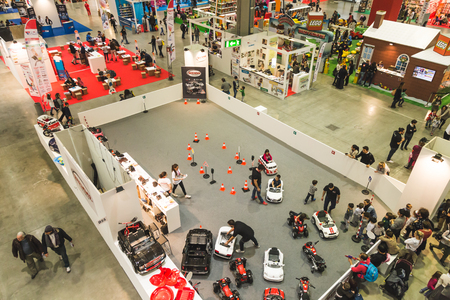 MILAN, ITALY - NOVEMBER 20: Top view of people and booths at G come giocare, trade fair dedicated to games, toys and children on NOVEMBER 20, 2015 in Milan.のeditorial素材