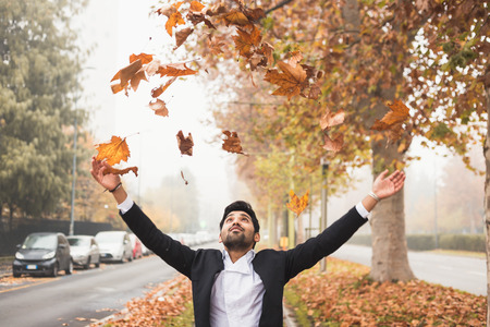 Portrait of a young handsome Indian man posing in an urban contextの写真素材