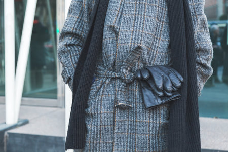 MILAN, ITALY - JANUARY 16: Detail of coat outside Jil Sander fashion show building for Milan Men's Fashion Week on JANUARY 16,2016 in Milan.のeditorial素材