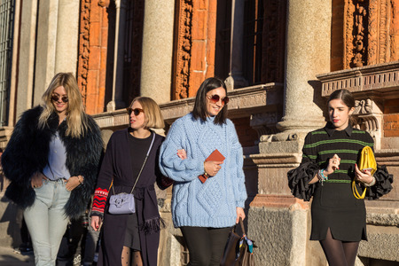 MILAN, ITALY - JANUARY 17: People gather outside Missoni fashion show building for Milan Men's Fashion Week on JANUARY 17, 2016 in Milan.のeditorial素材