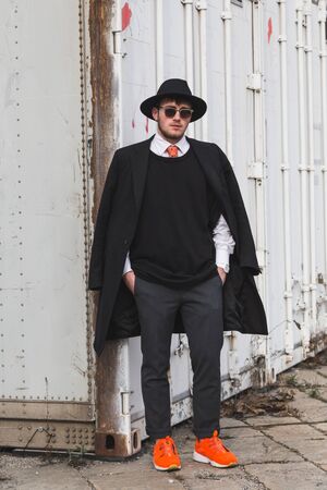MILAN, ITALY - FEBRUARY 24: People gather outside Gucci fashion show building for Milan Women's Fashion Week on FEBRUARY 24, 2016 in Milan.のeditorial素材