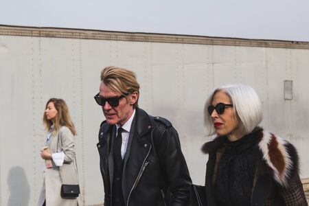 MILAN, ITALY - FEBRUARY 24: People gather outside Gucci fashion show building for Milan Women's Fashion Week on FEBRUARY 24, 2016 in Milan.のeditorial素材