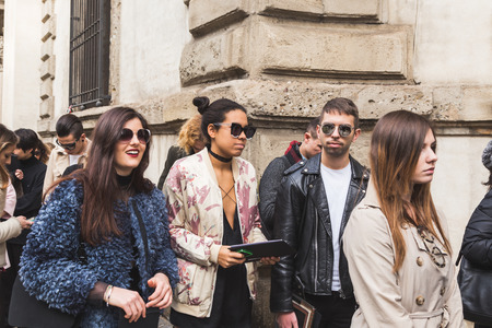 MILAN, ITALY - FEBRUARY 25: People gather outside Anteprima fashion show for Milan Women's Fashion Week on FEBRUARY 25, 2016 in Milan.のeditorial素材
