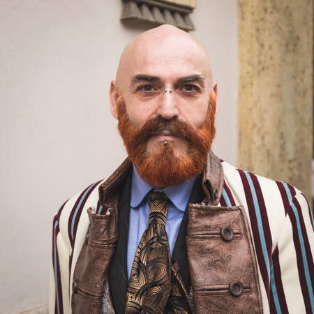 MILAN, ITALY - FEBRUARY 25: People gather outside Luisa Beccaria fashion show building for Milan Women's Fashion Week on FEBRUARY 25, 2016 in Milan.のeditorial素材